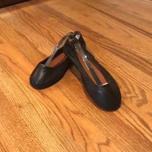 Black leather flats